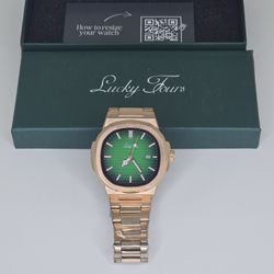 LUCKY FOURS MENS WATCH GREEN FACE  GOLD BAND .... PATEK STYLE LOOK.

NEW WITH BOX. $45 FIRM