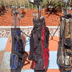 3 Golf Bags Of Golf Sticks.