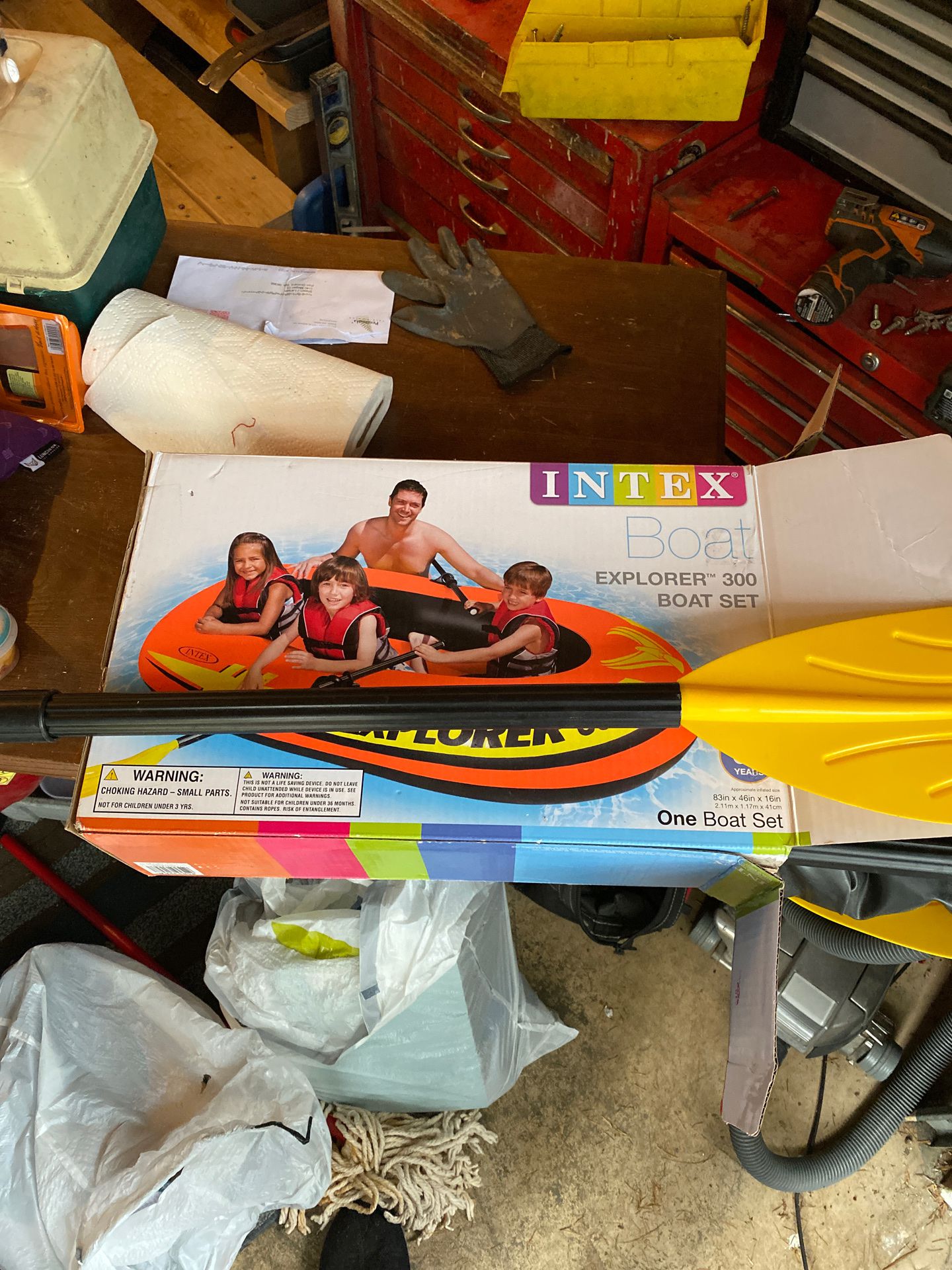Inflatable boat with oars