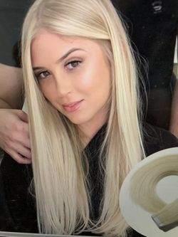 24 human hair tape in extensions. Platinum blonde. Each 14 Inches Long.
