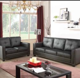 Modern style black leather couch and love seat