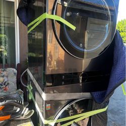 Stacked SMART Laundry Center 4.5 Cu.Ft. Front Load Washer & 7.4 Cu.Ft. Electric Dryer in Graphite St  