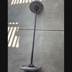 Weight Plates / Bar.     65 Dollars 