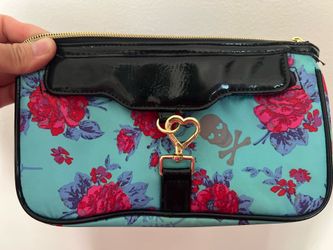 Betsy Johnson skull floral clutch