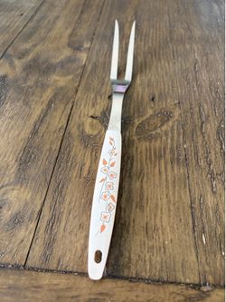 Vintage 1970s serving fork with plastic flour handle great condition