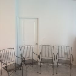  4 Wrought Iron  Chairs With Cushions