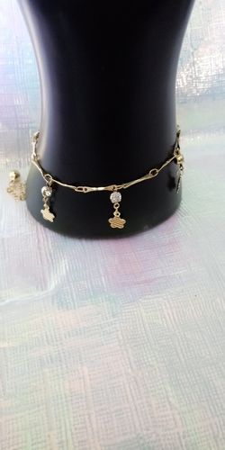 Pulcera para tobillo en chapa de Oro , ajustable