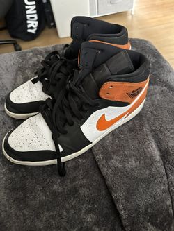 Orange AJ1s