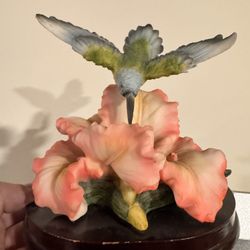 Hummingbird Figurine On Wooden Post