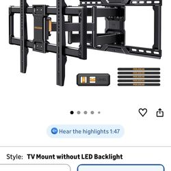 Tv wall mount up to 70 inches.    New and slightly used