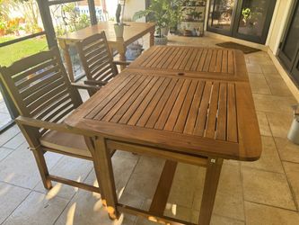 Phi Villa 7 piece Wooden Outdoor Dining Set with Expandable Table