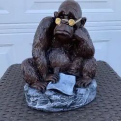 The Monkey With Glasses, Reading The Newspaper Statue