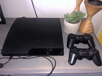 PS3 w/2 controllers & 12 games