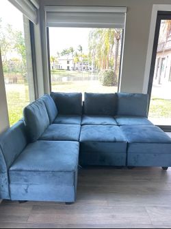 Blue modular sofa with storage