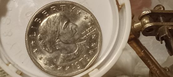 1979 S SBA DOLLAR REPUNCH MINT MARK, DOUBELING ON IN GOD WE TRUST, FG IS DISFIGURED