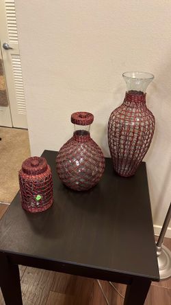 These items are decorative wicker-wrapped glass vases and jars, often used for Bohemian, coastal, or nautical home decor