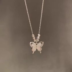 Cold wind ice through cat's eye stone butterfly necklace