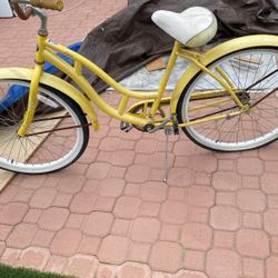 Yellow Schwinn Legacy Beach Cruiser