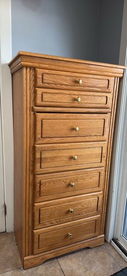 Tall wooden dresser- 57"H 29.5"L 18.5"W