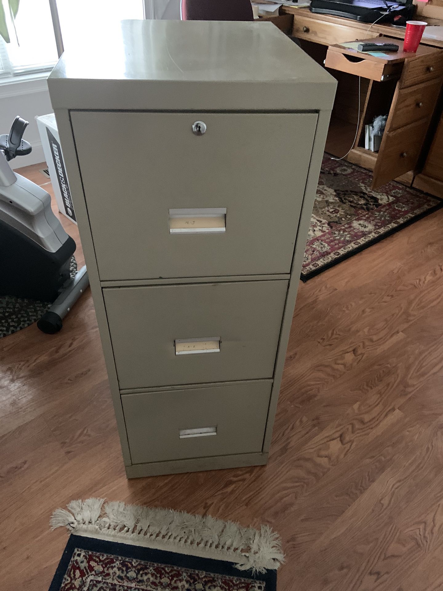 Three drawer file cabinet