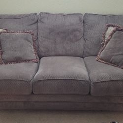 Green Couch And Loveseat With Pillows $25