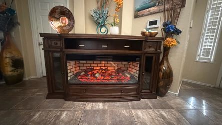Beautiful fireplace /tv stand with 7 colors of flames 75” inches long