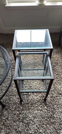 Pair of nesting glass end tables