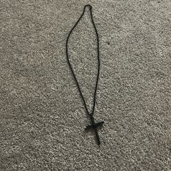 A blackout metallic Cross (Chain)