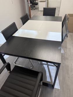 Eight Chairs And A Table