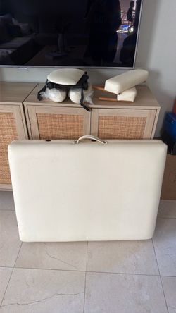 Massage table
