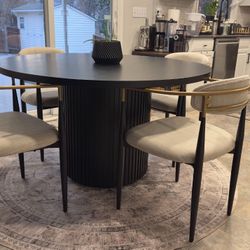 Steve Silver Colvin 52 in. Round Black Wood Top Pedestal Dining Table Seats 6