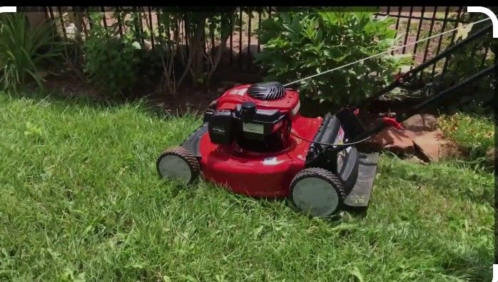 Used Push Mower And Like New Weed Eater