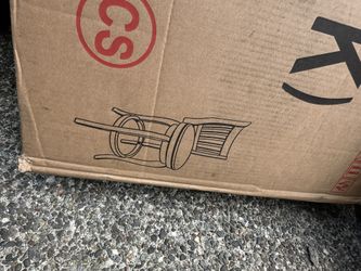 An open box of barstools Set Of 4