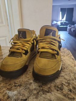 The brand is Jordan the color is grey , white and black, the size is 5