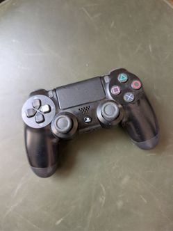 Official Sony DualShock 4 Wireless Controller for PS4 - Jet Black (CUH-ZCT2U)