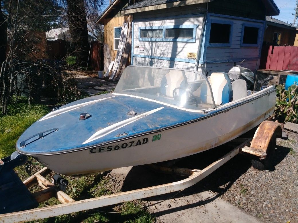 Trailer with fiber glass boat