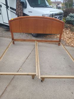 Free...pickup King size oak headboard with metal frame
