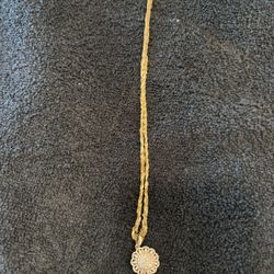 10k  Gold Necklace With A Pink Diamond Pendant