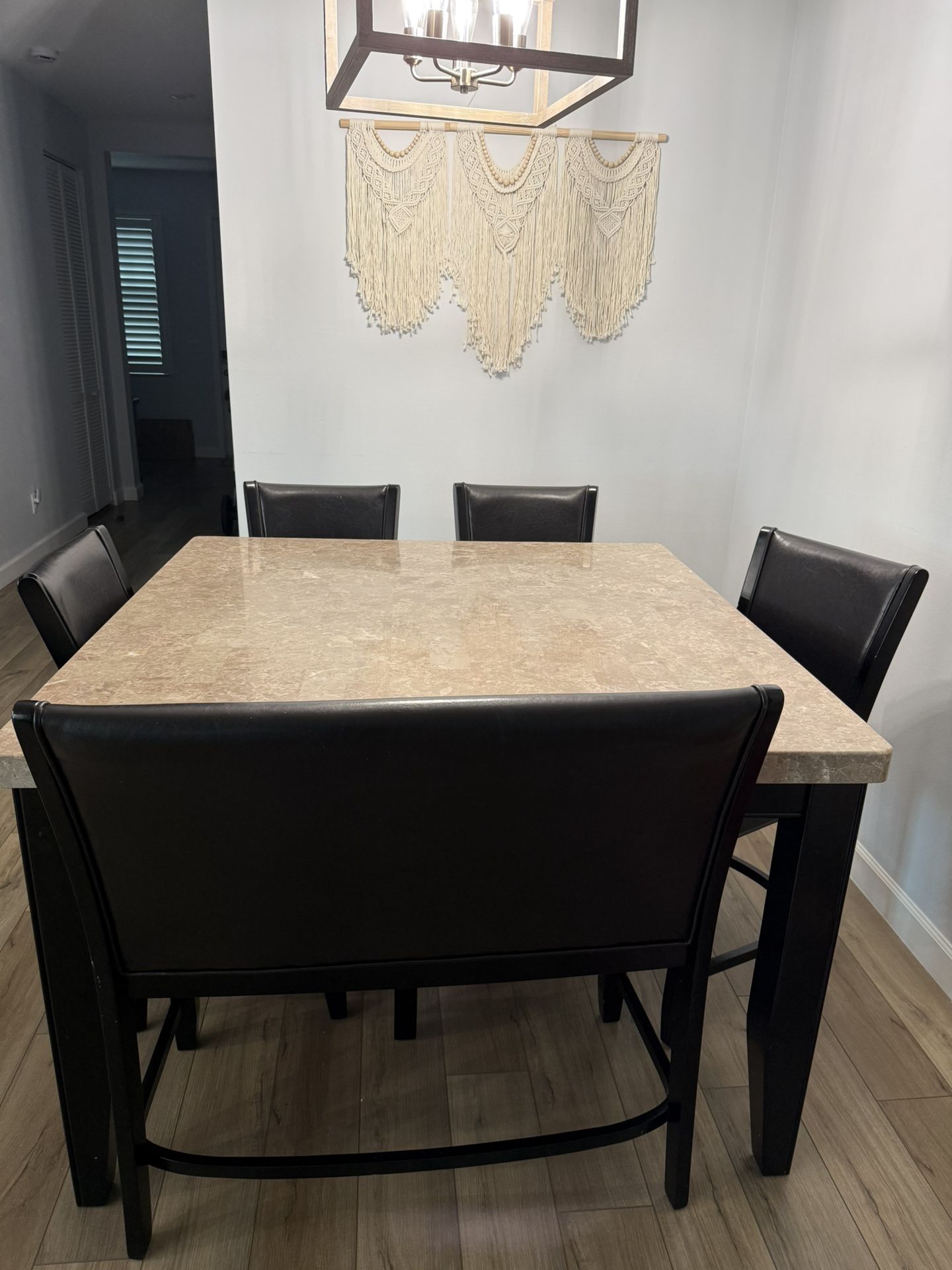 Haverty’s marble counter height dining room table for sale 