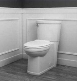 American Standard Cadet 3 Decor Tall Height 2-Piece 1.28 GPF Single Flush Elongated Toilet with Seat in White, Seat Included