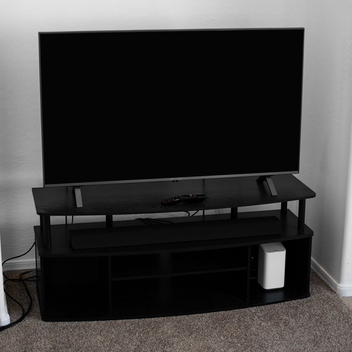 4K 50 inch TV, Sound Bar, and Entertainment Center