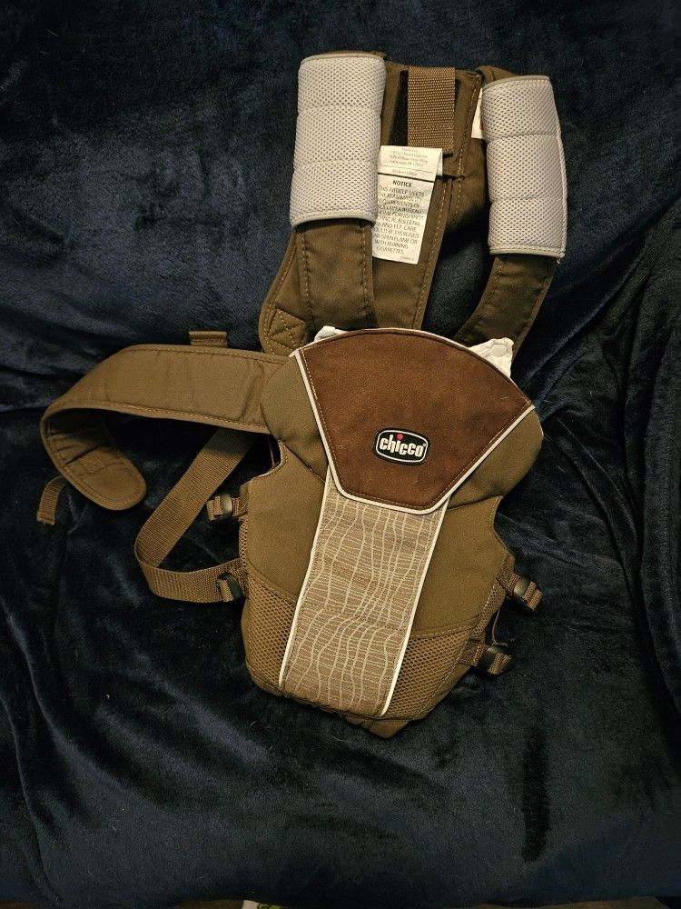 2 Baby Carriers Brown And Black.