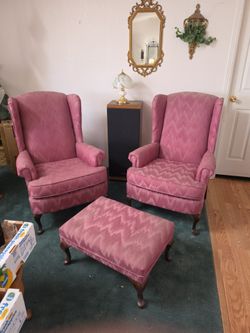 2 old chairs and a foot stool.