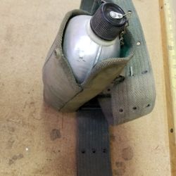 Metal Canteen In Carrier On Belt