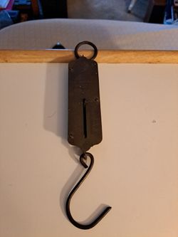 Antique weight scale, very old.