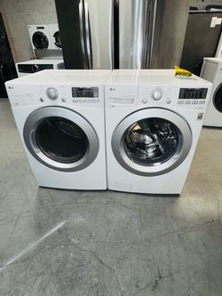 LG electric washer and dryer; includes a receipt for a 60-day warranty.
