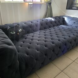 Blue Tufted Sofa