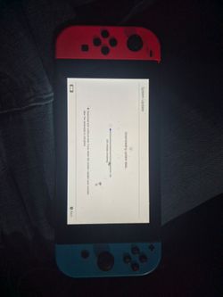 Nintendo Switch with Neon Red and Blue Joy-Cons