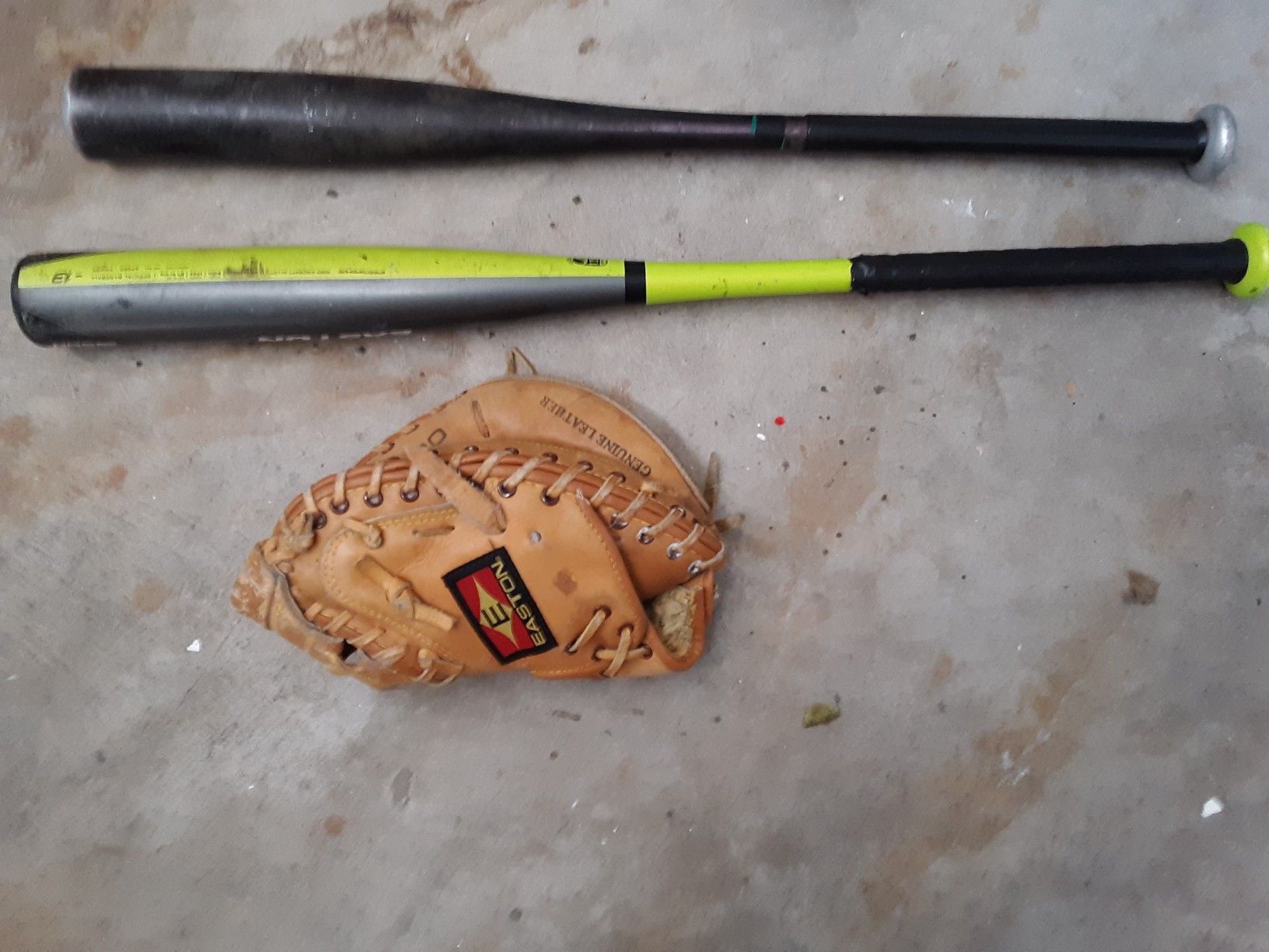 Looking to trade two bats and a catchers mitt for a baseball glove