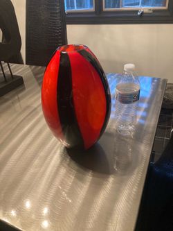Stunning, red and black vase. Five dollars. Pick up in Willowick.